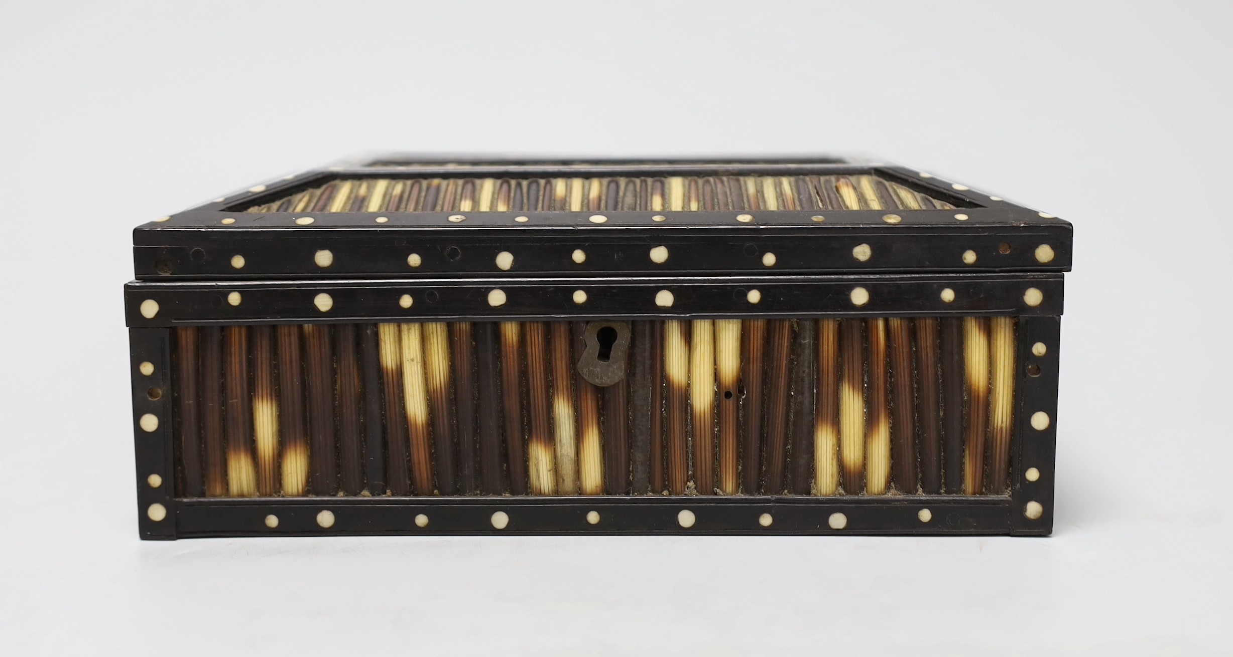 An Indian bone inlaid ebony and porcupine quill rectangular box, 20cm